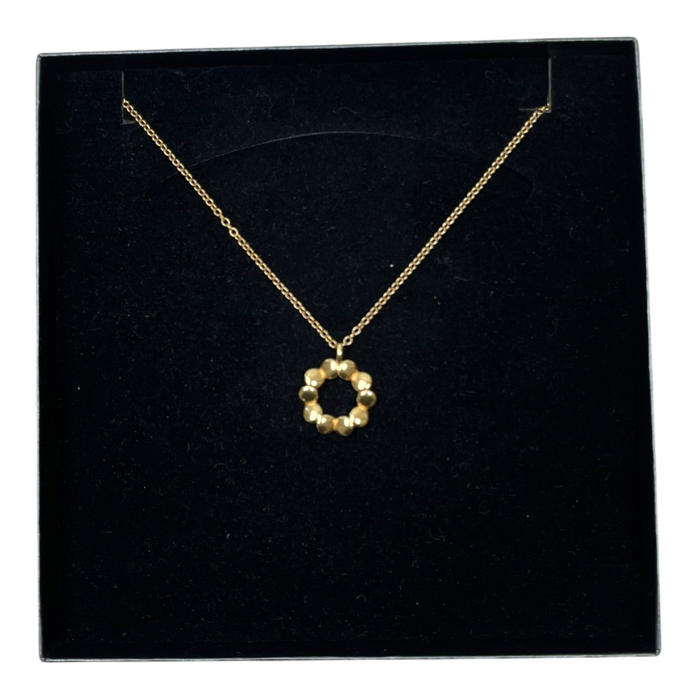 Kalevala Koru kotipesä necklace, golden bronze