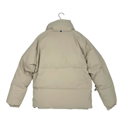 Embassy of Bricks and Logs Novelty puffer jacket, sand | unisex L
