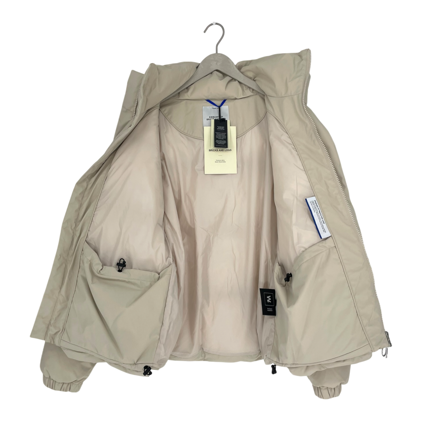 Embassy of Bricks and Logs Novelty puffer jacket, sand | unisex L
